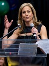 Alice at podium